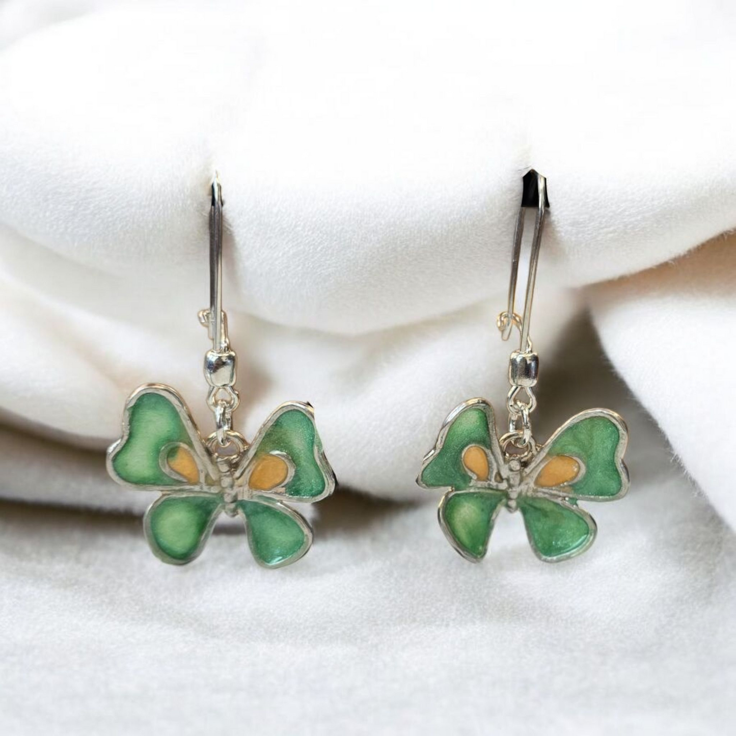 Mariposa Libertad plata 950 gancho, encapsulada verde y amarillo