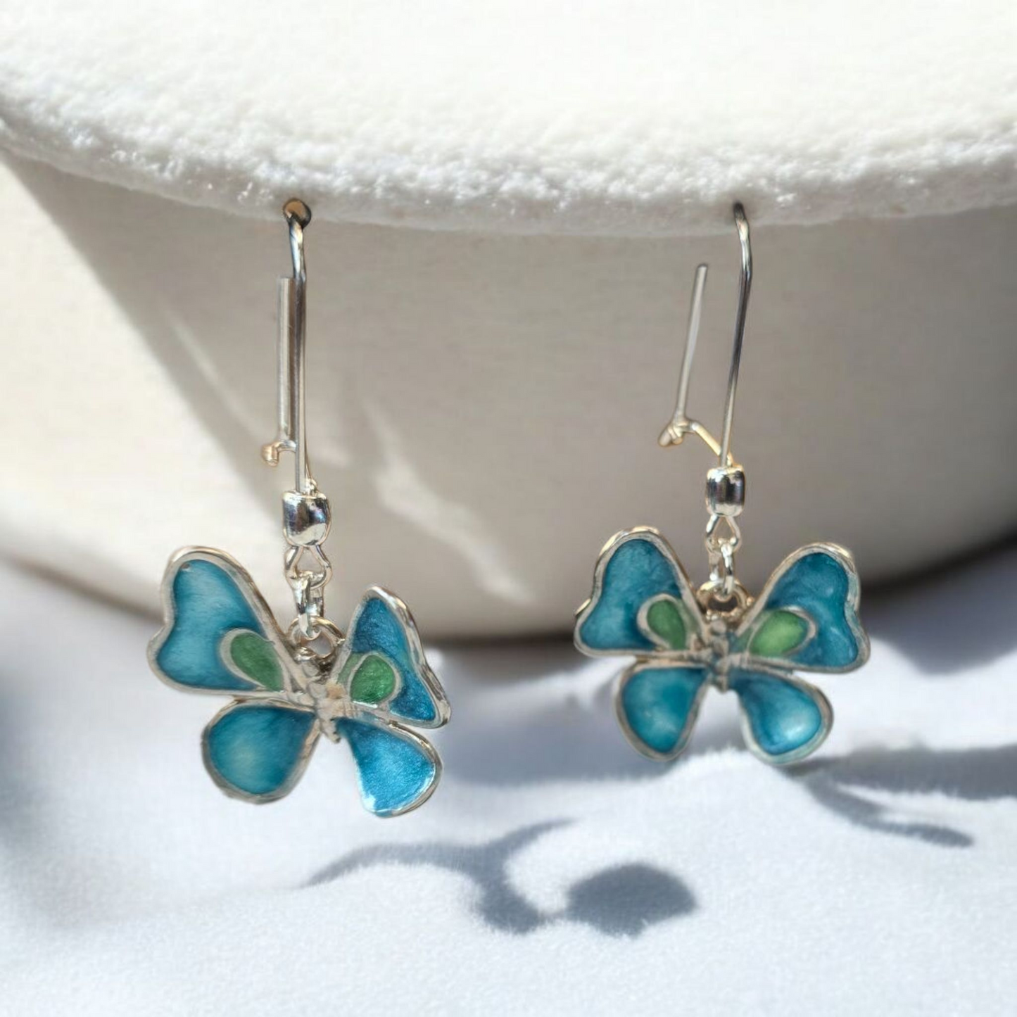Mariposa Libertad plata 950 gancho, encapsulada azul y verde