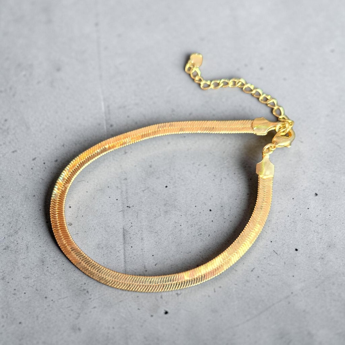 Pulsera cinta Baño en oro
