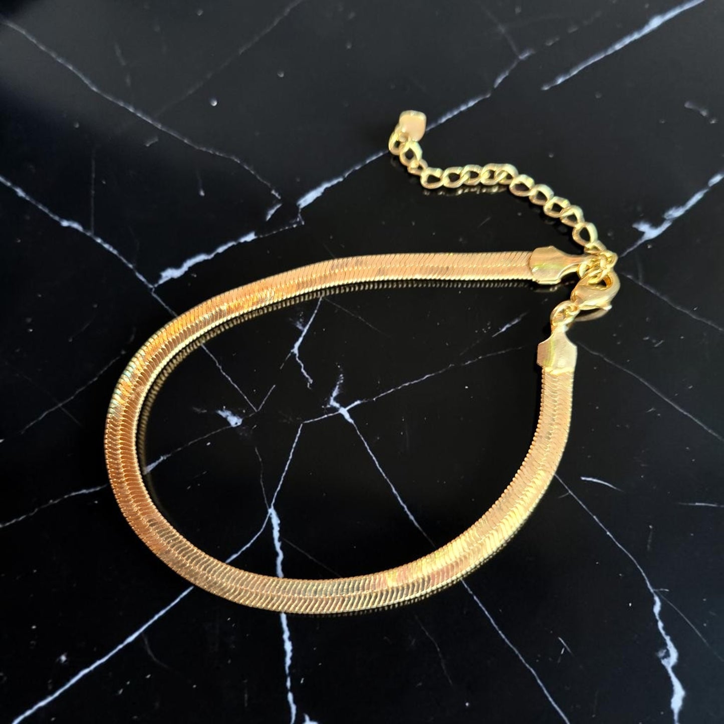 Pulsera cinta Baño en oro